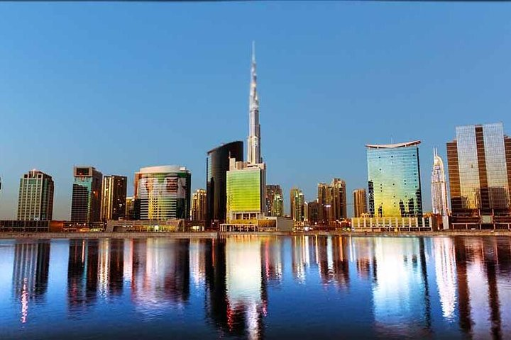 Experience the unique blend of modern architecture and traditional charm in Dubai where iconic skyscrapers reflect on serene waters creating an unforgettable backdrop for your adventure.